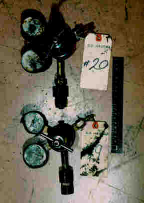 Regulators and guages removed from oxyacetylene tanks